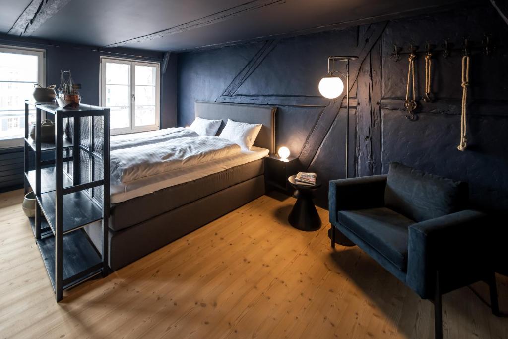 Letto o letti in una camera di JACOB 1808. fine historic town apartments