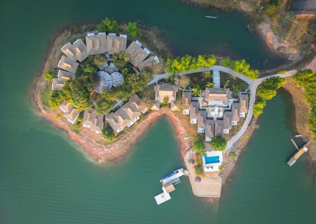 an aerial view of an island in the water at The Sanctuary Nam Ngum Beach Resort in Vang Vieng