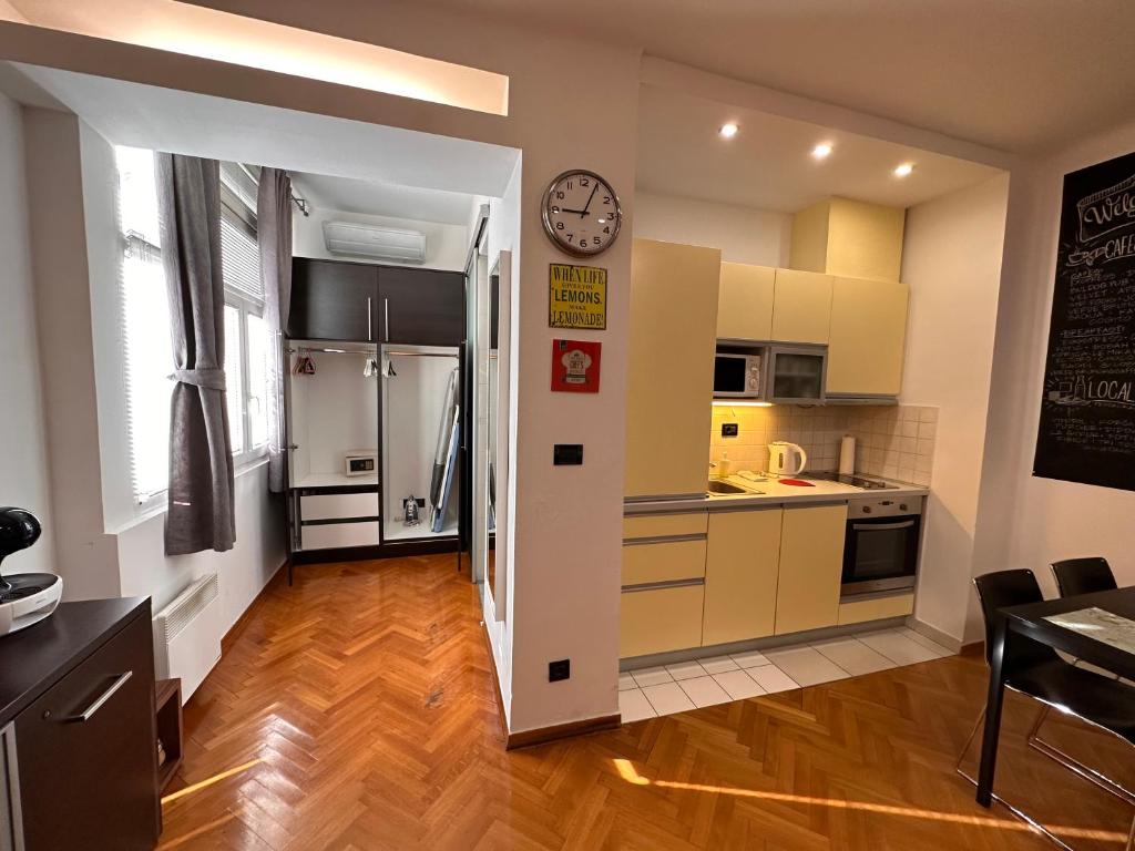 Kuchyň nebo kuchyňský kout v ubytování Apartments Mango Downtown