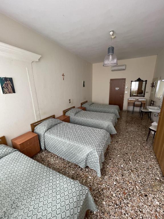 Postel nebo postele na pokoji v ubytování Casa Caburlotto