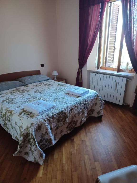 Postel nebo postele na pokoji v ubytování Casa Belvedere
