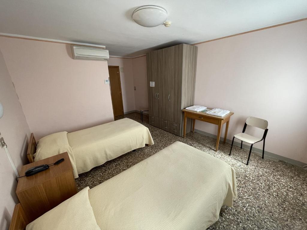 Postel nebo postele na pokoji v ubytování Casa Caburlotto