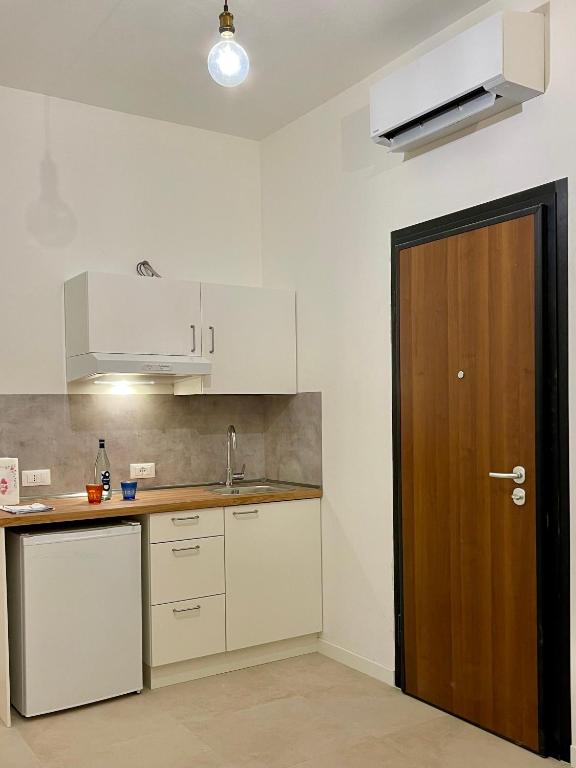 Kuchyň nebo kuchyňský kout v ubytování Villa Dinesh