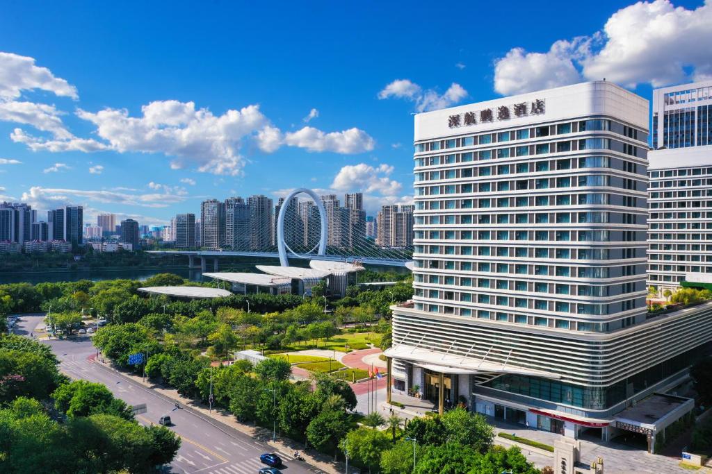 a view of the marriott hotel in a city at SHENZHENAIR SKY PARK LIUZHOU in Liuzhou
