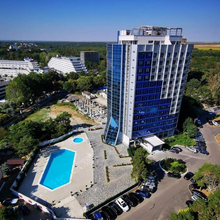 an overhead view of a tall building with a pool at Euphoria Olimp in Olimp