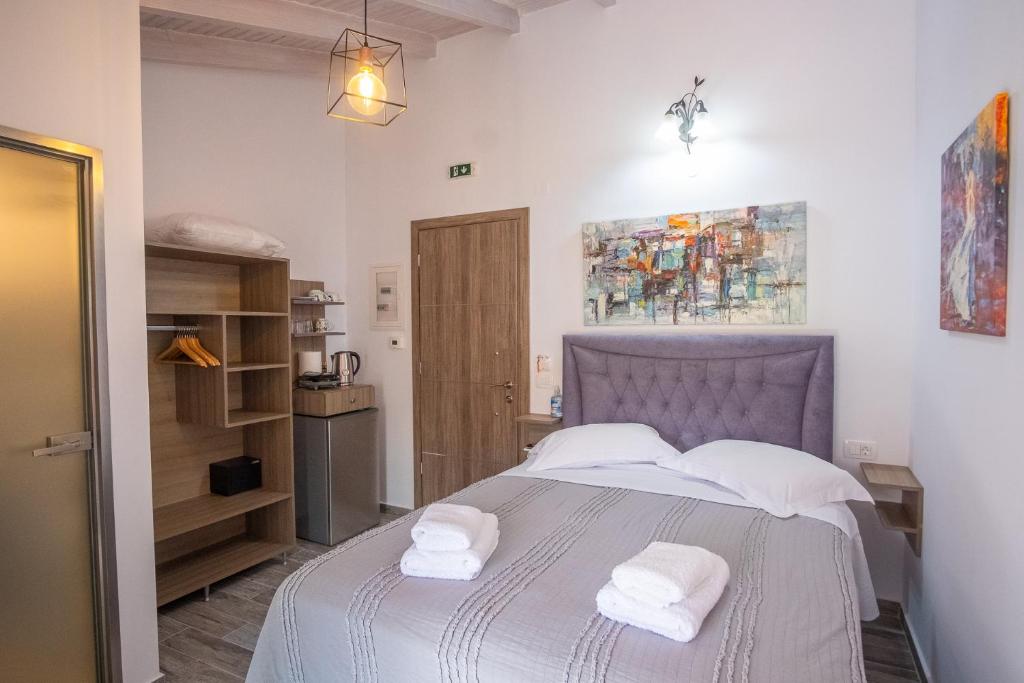 Letto o letti in una camera di Serenity Luxe Suites