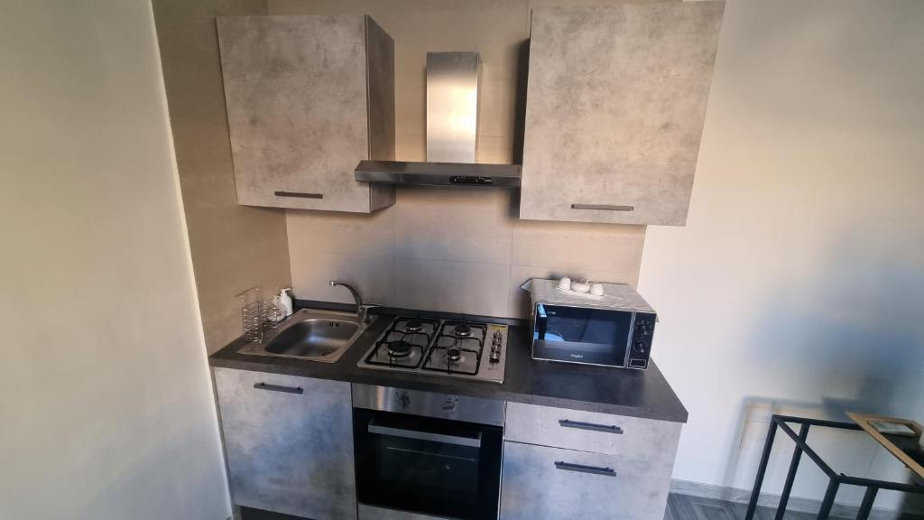 Kuchyňa alebo kuchynka v ubytovaní Centonze Apt - Messina centro