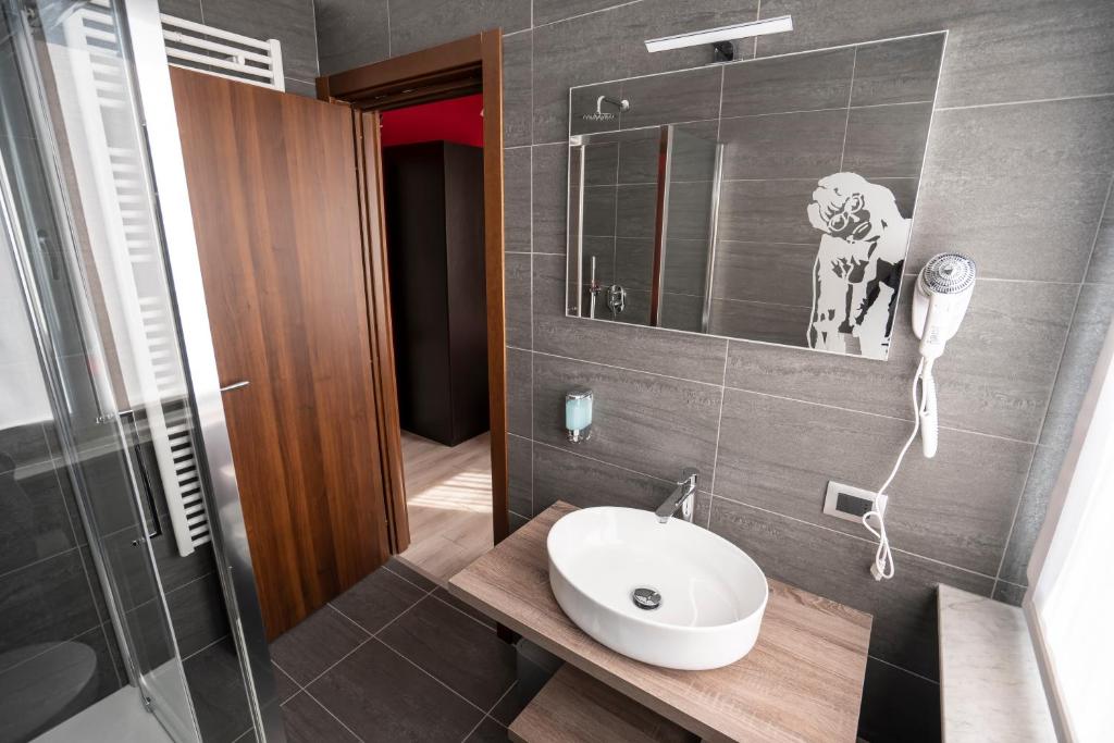 Koupelna v ubytování Binario Magic RistoHotel