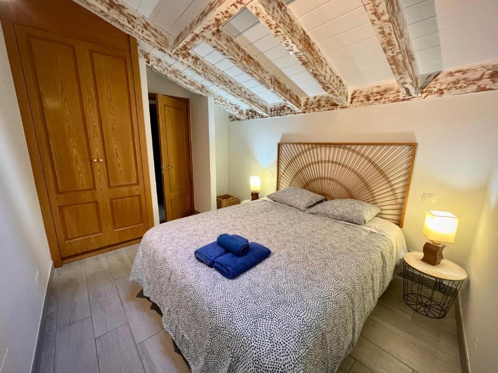 Ένα ή περισσότερα κρεβάτια σε δωμάτιο στο Atuaire Home Mirador de Saldaña en pleno centro Historico