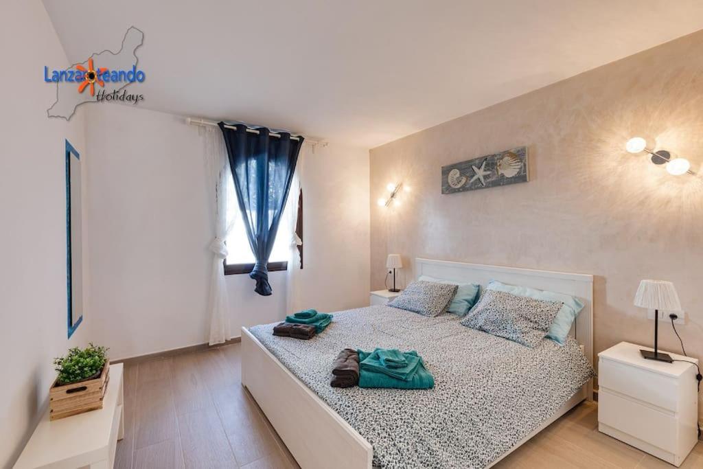 Postel nebo postele na pokoji v ubytování Vivienda Vacacional Papillon