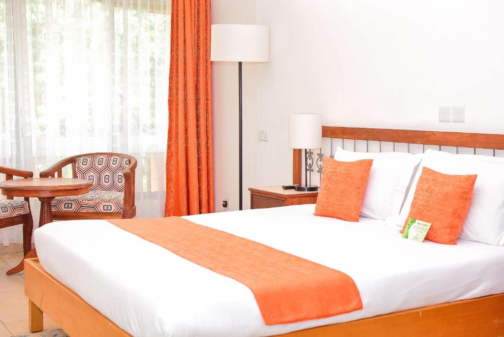 Letto o letti in una camera di Hotel Boulevard Nairobi, City Centre CBD