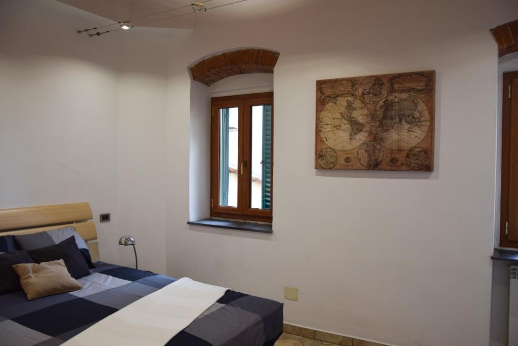 En eller flere senge i et værelse på San Giovanni