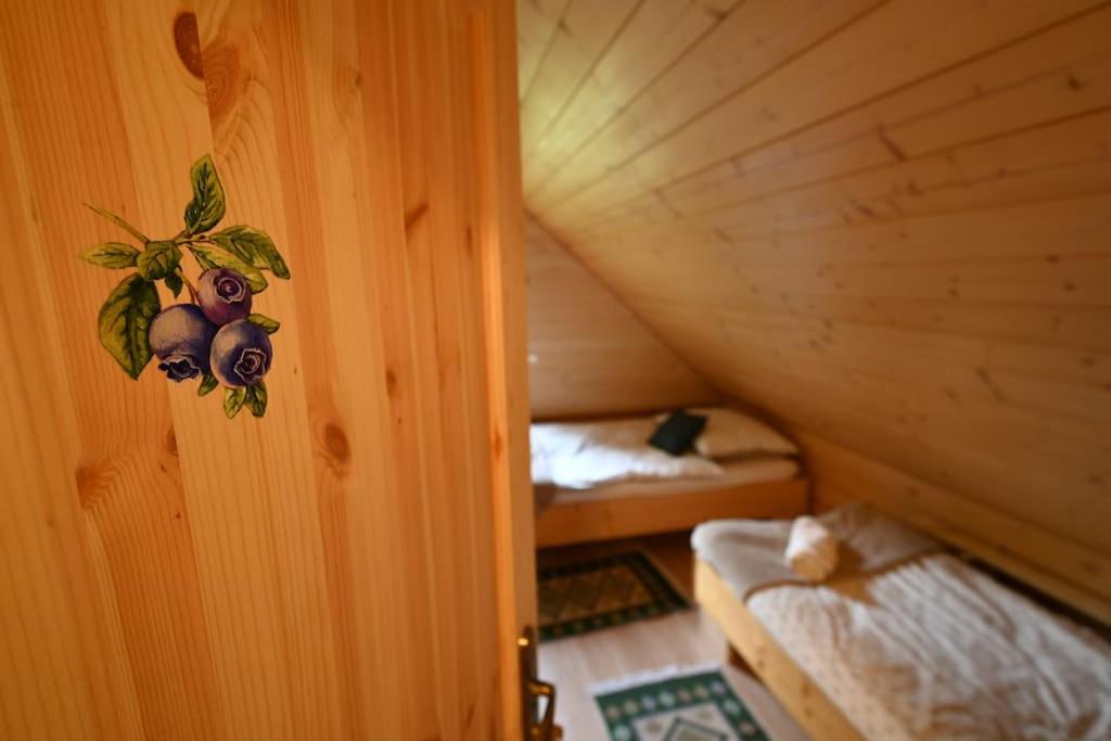 Postel nebo postele na pokoji v ubytování Poziomkowy Dom- Wisła, Dom z bali, Sauna, Taras