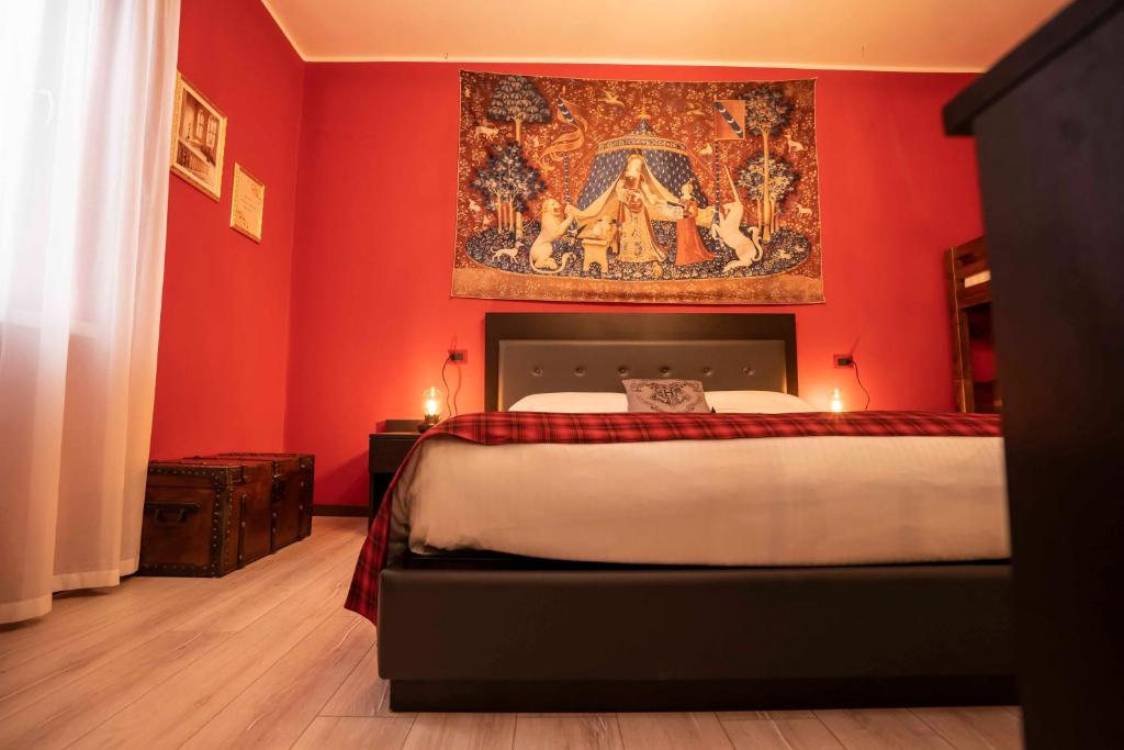 Postel nebo postele na pokoji v ubytování Binario Magic RistoHotel