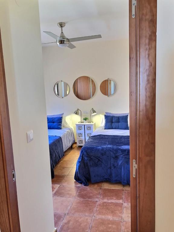 Postel nebo postele na pokoji v ubytování Penthouse Mojon Hills
