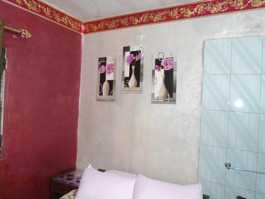 Postel nebo postele na pokoji v ubytování City Hostel