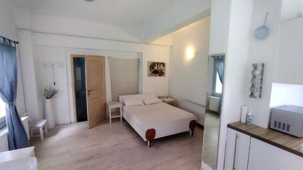 Postel nebo postele na pokoji v ubytování Hotel Mato