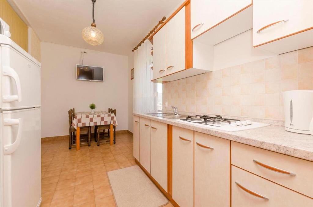 Kuchyňa alebo kuchynka v ubytovaní Apartments Spavalo