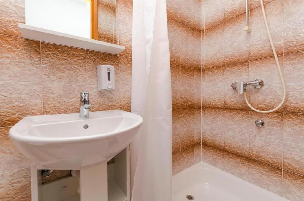 Kúpeľňa v ubytovaní Apartments Spavalo