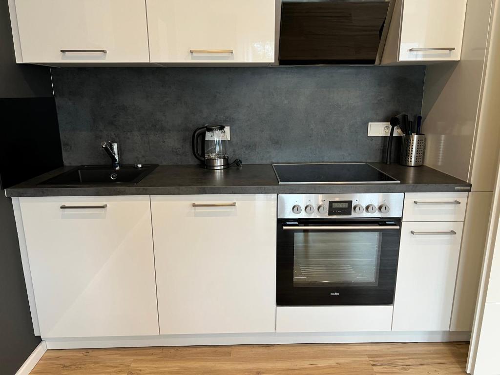 Kuchyň nebo kuchyňský kout v ubytování Ferienwohnung Franzi