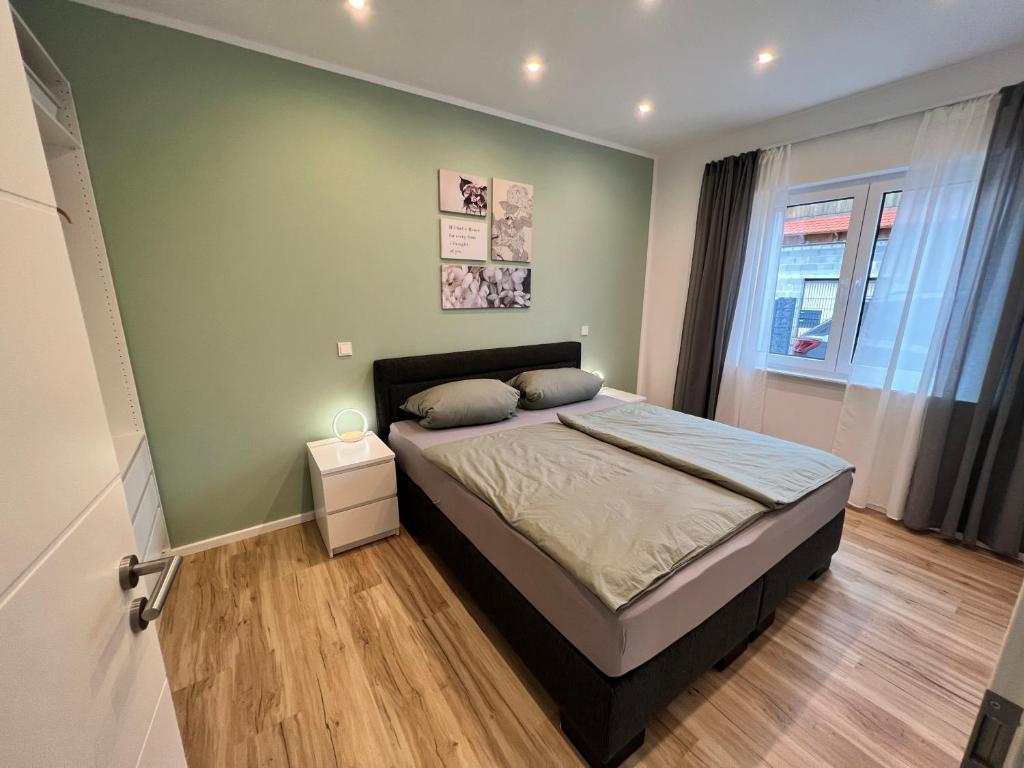 Postel nebo postele na pokoji v ubytování Ferienwohnung Franzi