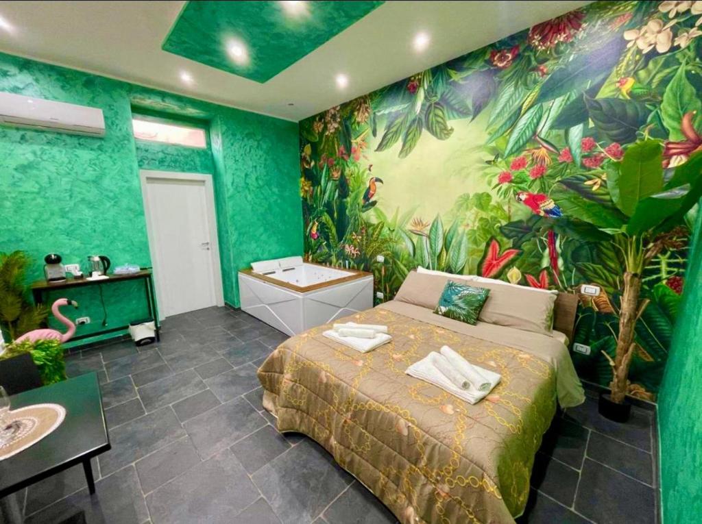 Postel nebo postele na pokoji v ubytování Suite Amazzonia