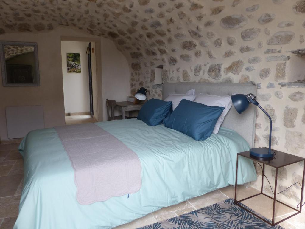 Postel nebo postele na pokoji v ubytování clos de Beauregard
