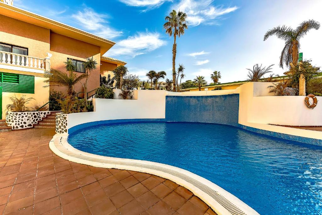 The swimming pool at or close to Ferienwohnung Sea View Playa Paraiso