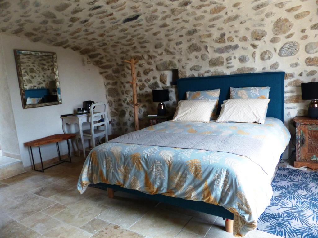 Postel nebo postele na pokoji v ubytování clos de Beauregard
