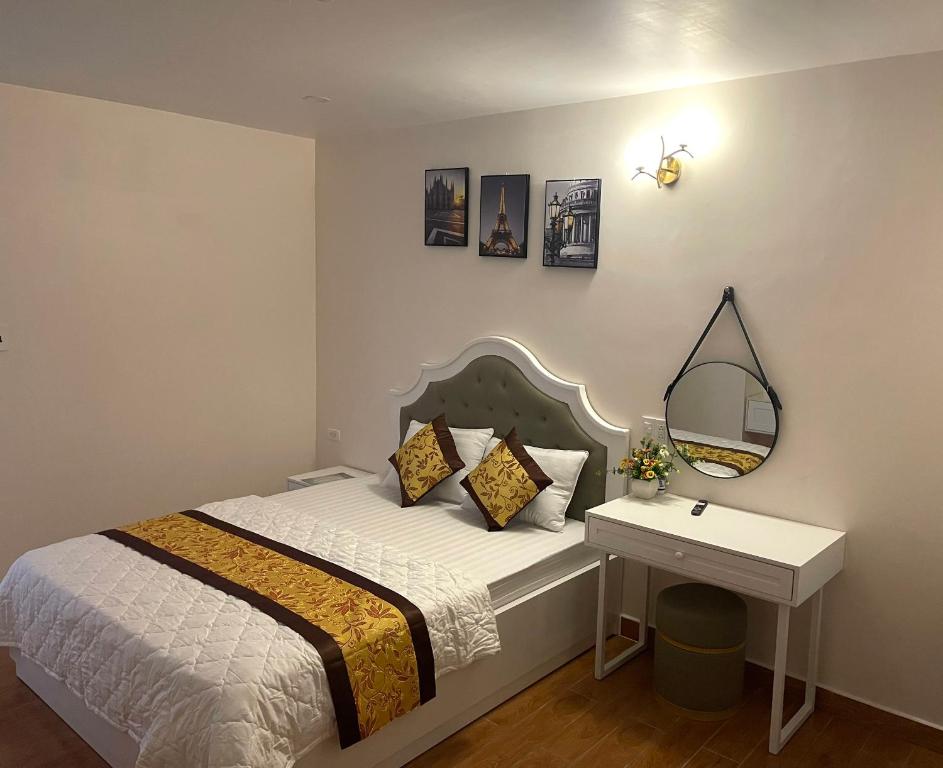 Postel nebo postele na pokoji v ubytování Thinh Gia Hotel