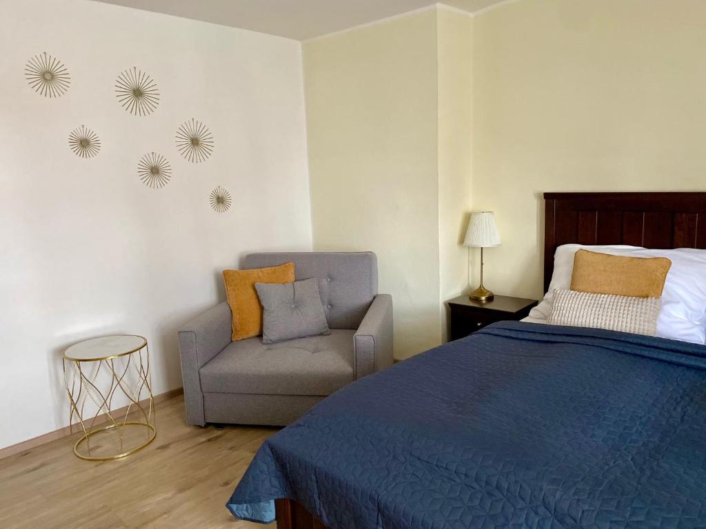 Postel nebo postele na pokoji v ubytování Zámecký Hotel ANTON FLORIAN