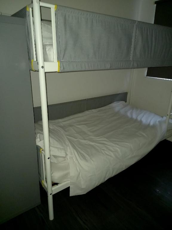 Postel nebo postele na pokoji v ubytování Byron View House