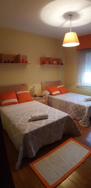 Posteľ alebo postele v izbe v ubytovaní "O Descanso do Camiño"