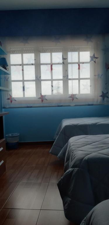 Posteľ alebo postele v izbe v ubytovaní "O Descanso do Camiño"