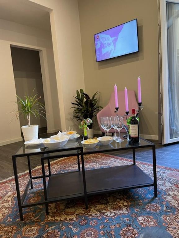 TV a/nebo společenská místnost v ubytování Hotel Delle Camelie