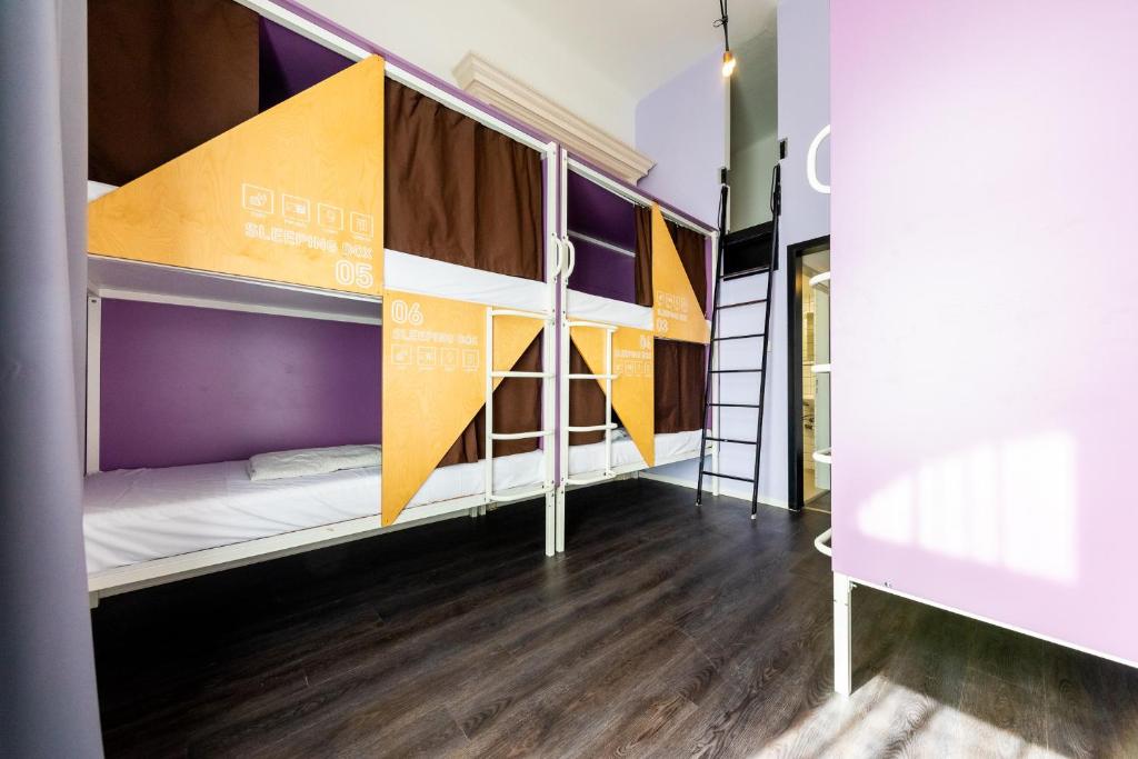 Posteľ alebo postele v izbe v ubytovaní Adagio Hostel Basilica