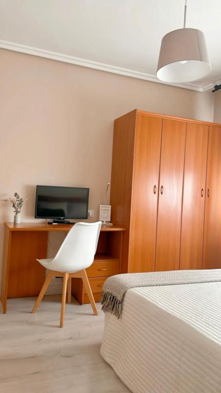 Postel nebo postele na pokoji v ubytování Casa Pazos, Pedrafita do Cebreiro