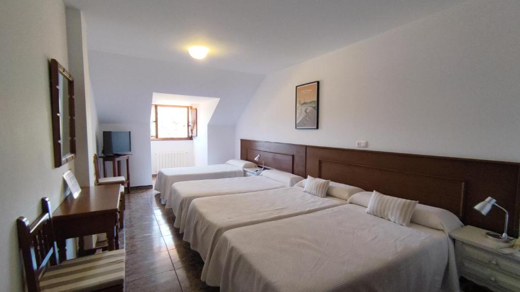 Cama o camas de una habitación en Hotel Solatorre