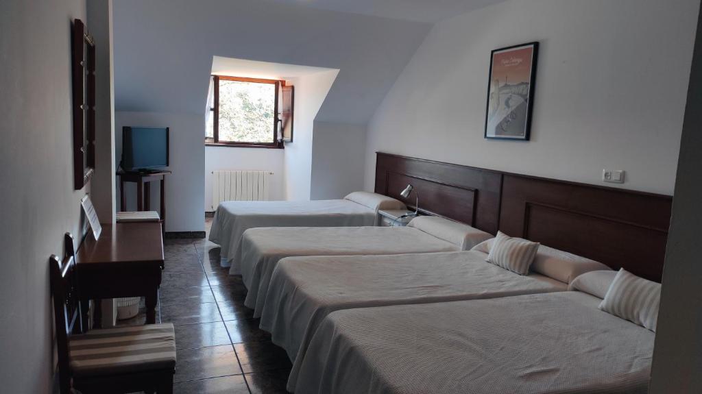 Cama o camas de una habitación en Hotel Solatorre