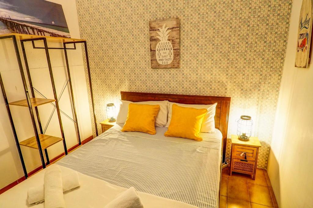 A bed or beds in a room at Charming Patio by Hello Homes Sitges