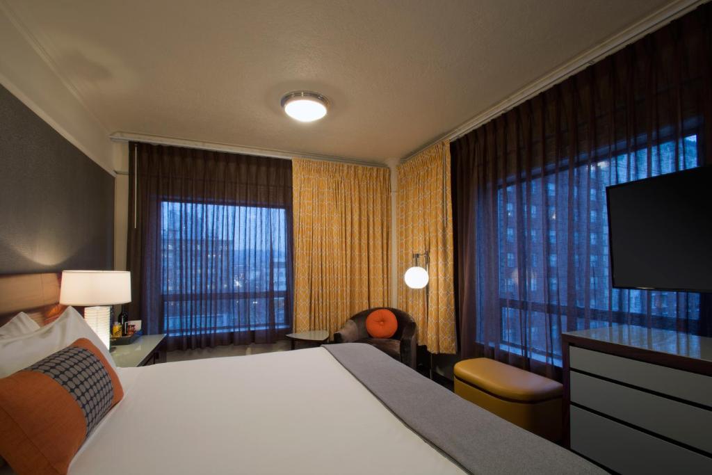 Postel nebo postele na pokoji v ubytování Hotel Lucia