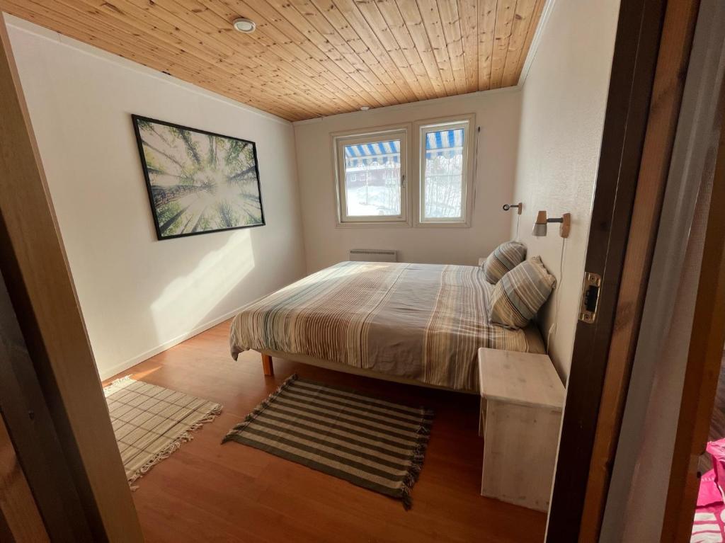 Postel nebo postele na pokoji v ubytování Långrösta 48-49, Appartementen in Hagfors