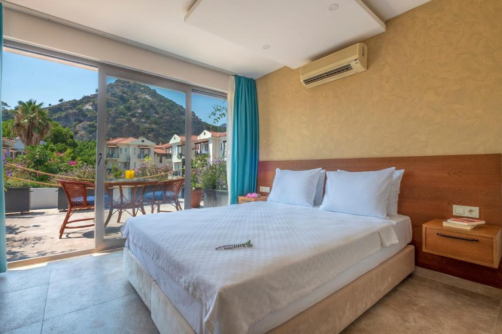 Postel nebo postele na pokoji v ubytování On Oda Oludeniz