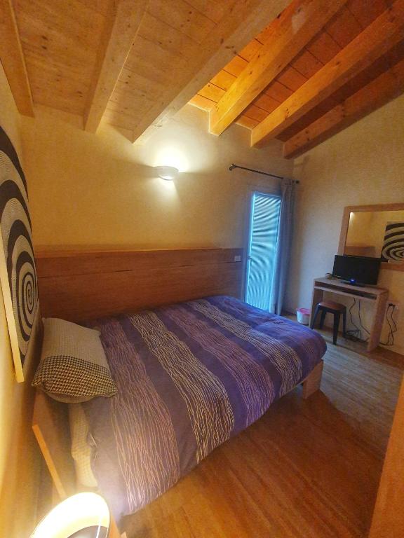 Postel nebo postele na pokoji v ubytování Il Camino Rosso