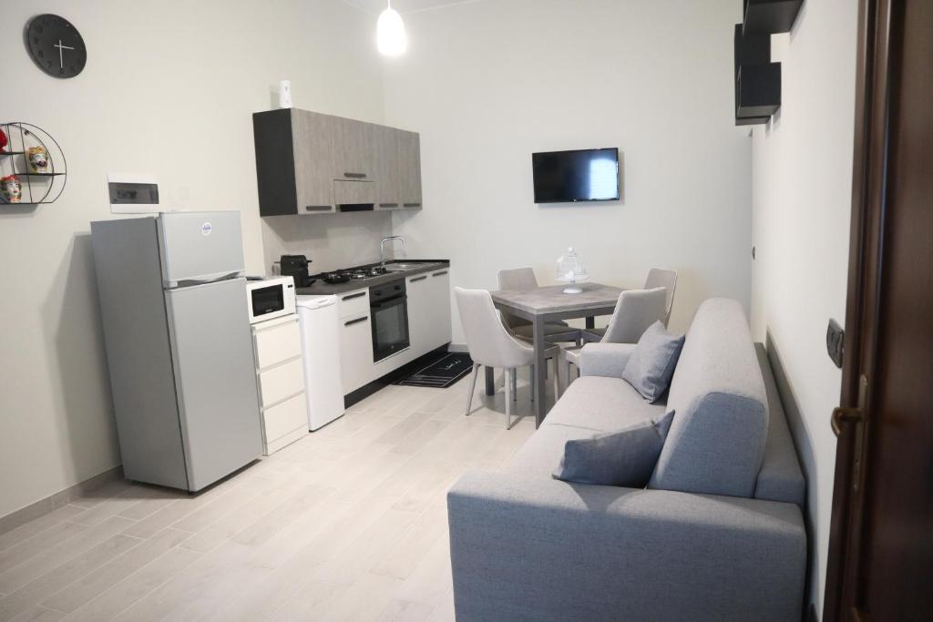 A kitchen or kitchenette at Sophia Apartments