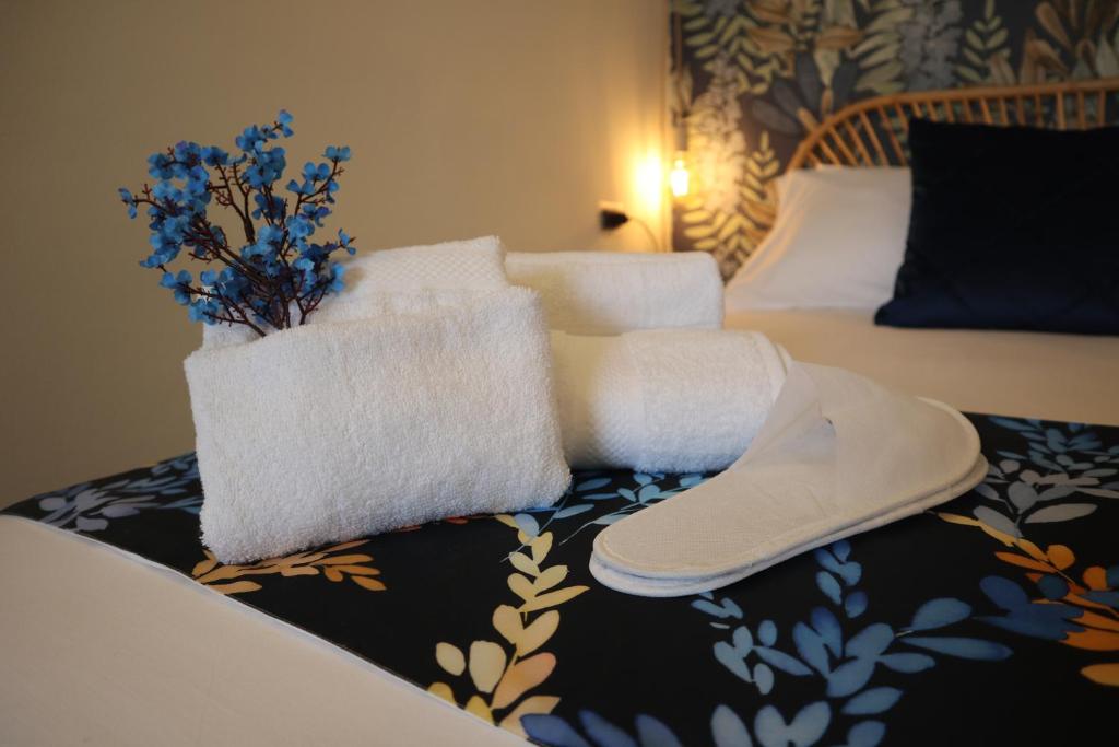 A bed or beds in a room at Sophia Apartments