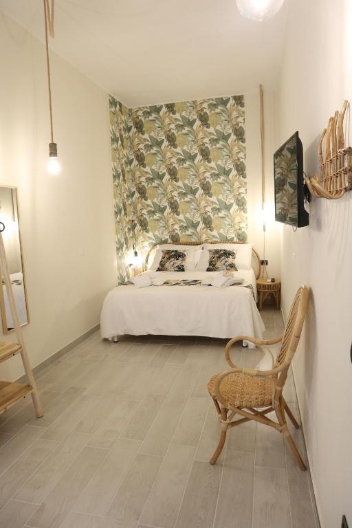 A bed or beds in a room at Sophia Apartments