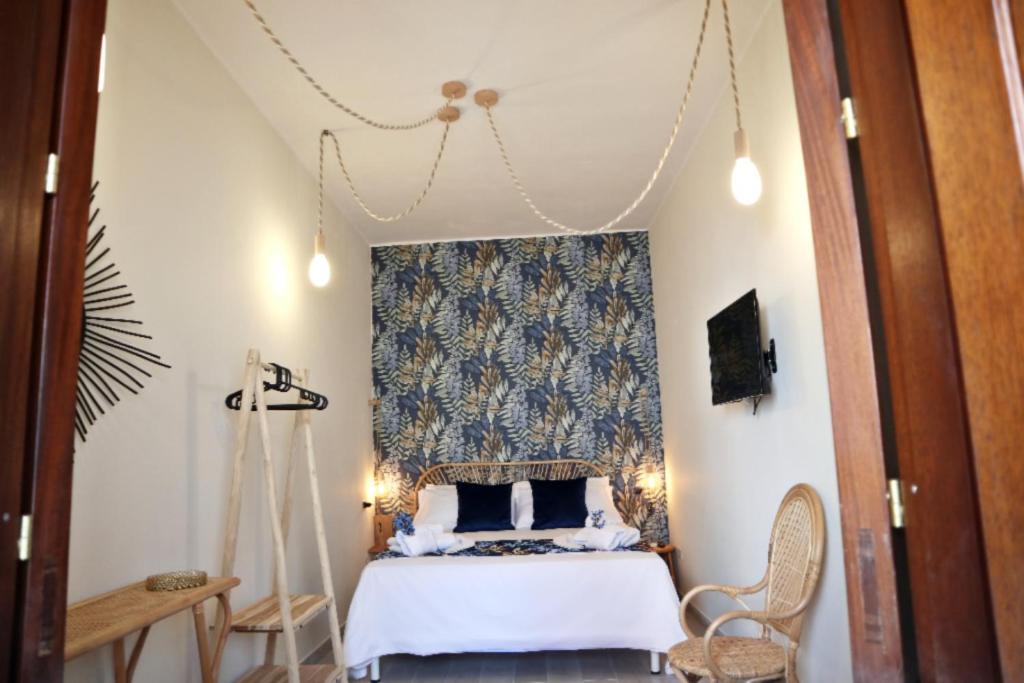 A bed or beds in a room at Sophia Apartments