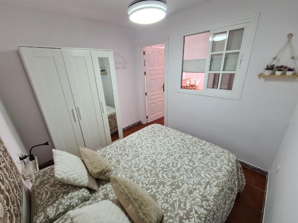Postel nebo postele na pokoji v ubytování VILLA PITATO Nuevo, cerca de la Playa, Parking en la puerta del alojamiento