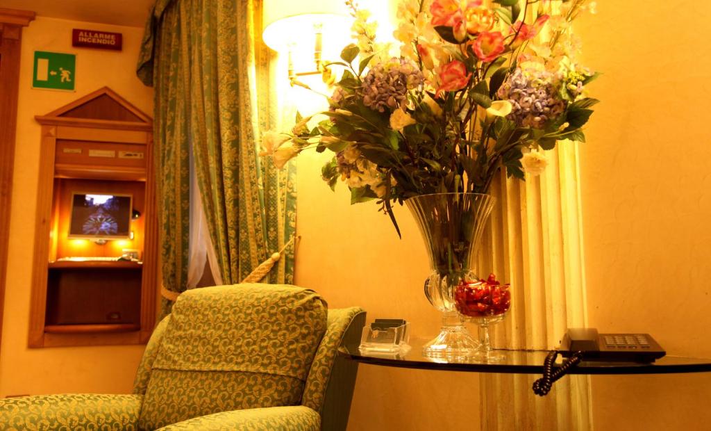 Posezení v ubytování Colonna Hotel